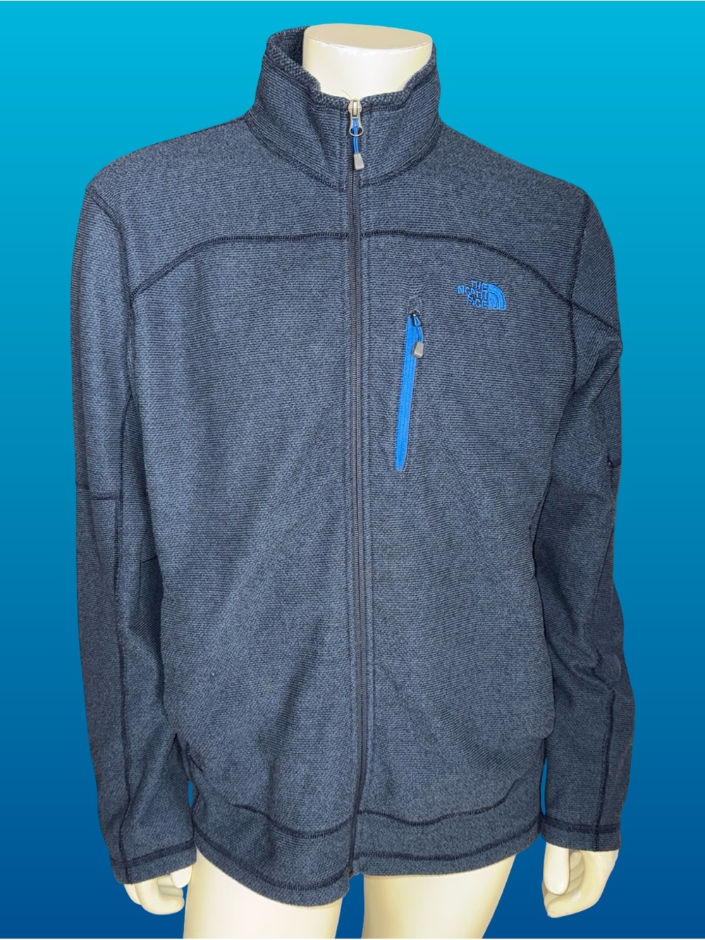 The North Face Men’s Dark Gray Performance Zip Jacket with Blue Trim